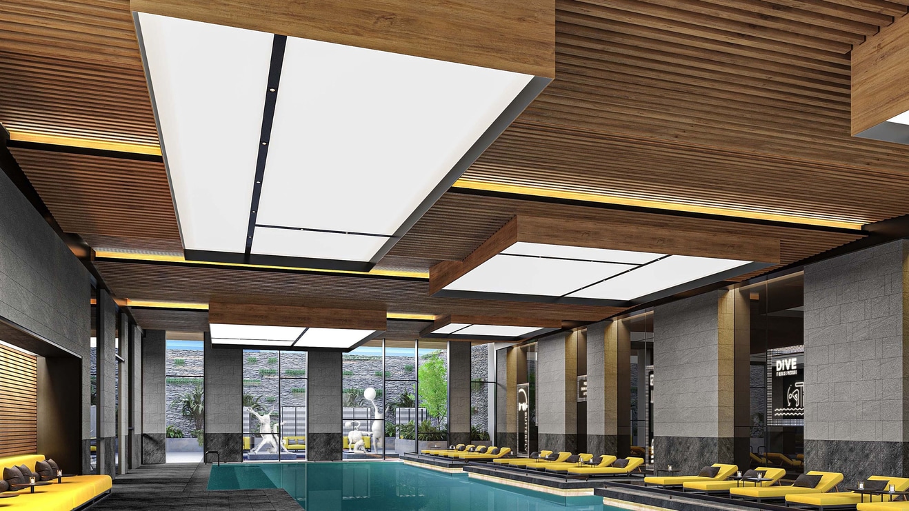 Indoor swimming pool with garden view